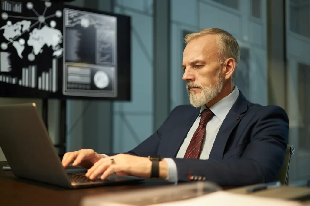 A man typing on a computer.