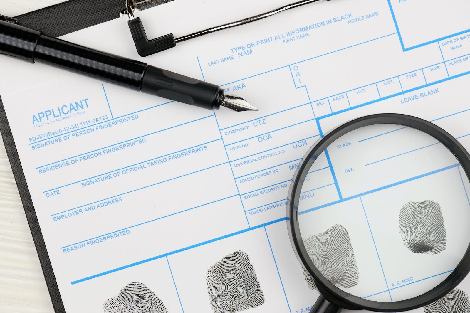 A form with finger prints on it.