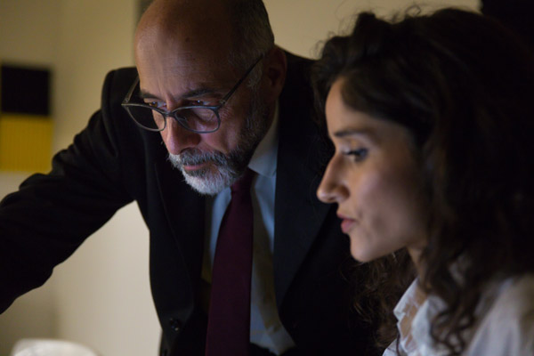 private investigator showing client computer